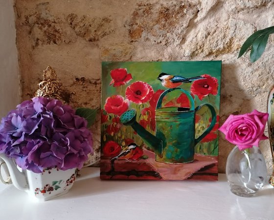 Watering can and birds