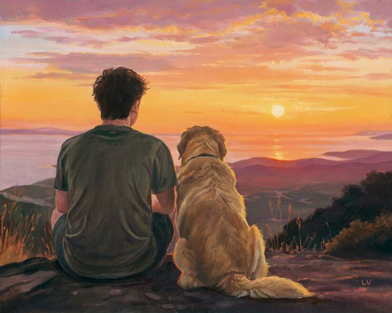 Boy sitting with a Golden Retriever dog