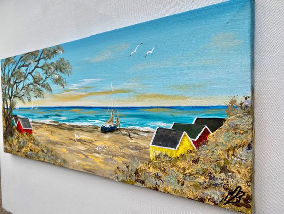 Beach Huts in a Cove