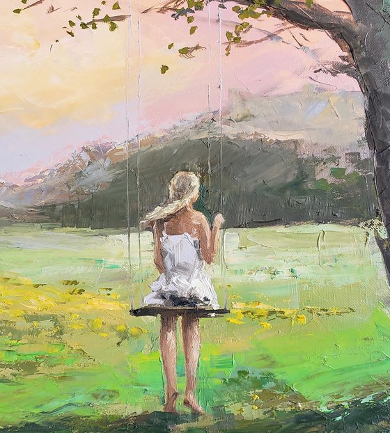 GIRL ON A SWING. EVENING.