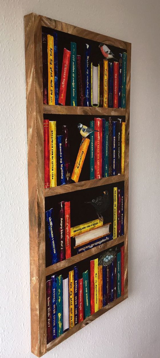 Bookshelf with a blackbird