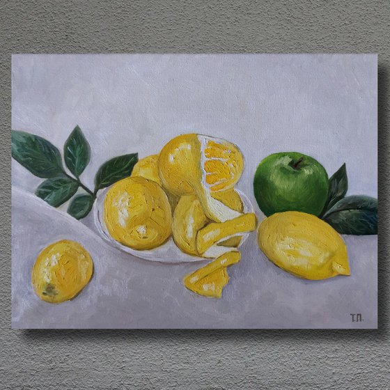 Still life with lemons and apple