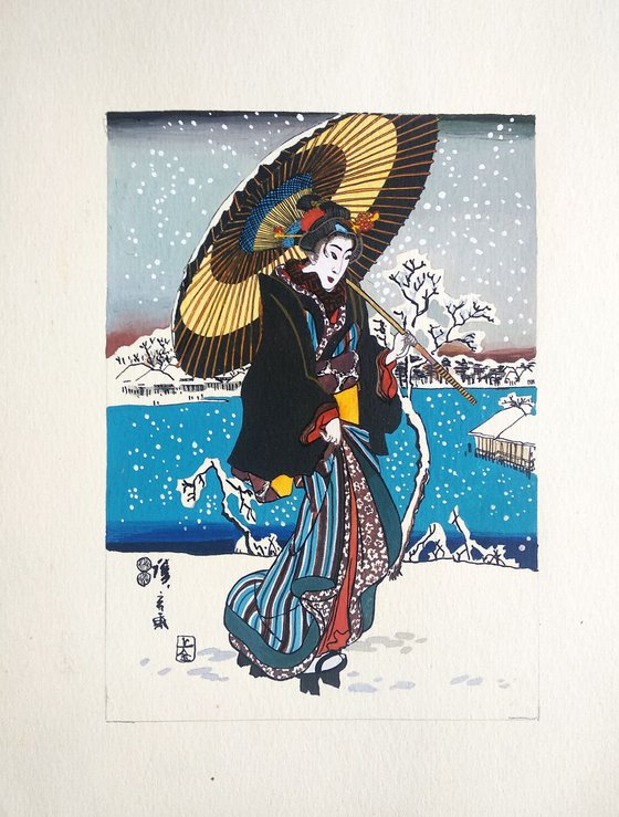 Young woman with umbrella and snow