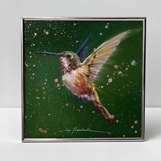 Hummingbirds in flight.