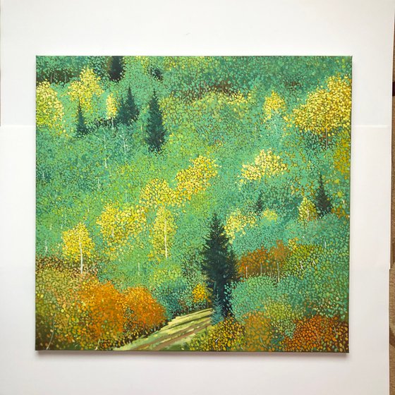 Green forest with yellow aspens