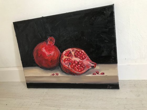 Original painting of pomegranates on the table
