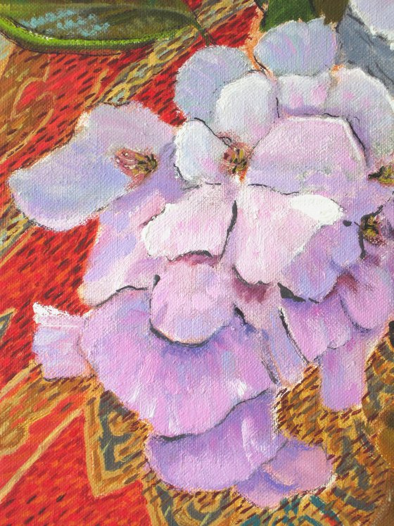 Blossom against Red Fabric