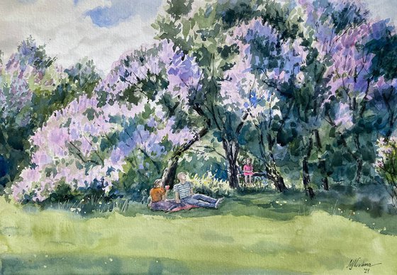 Picnic in the city lilac garden