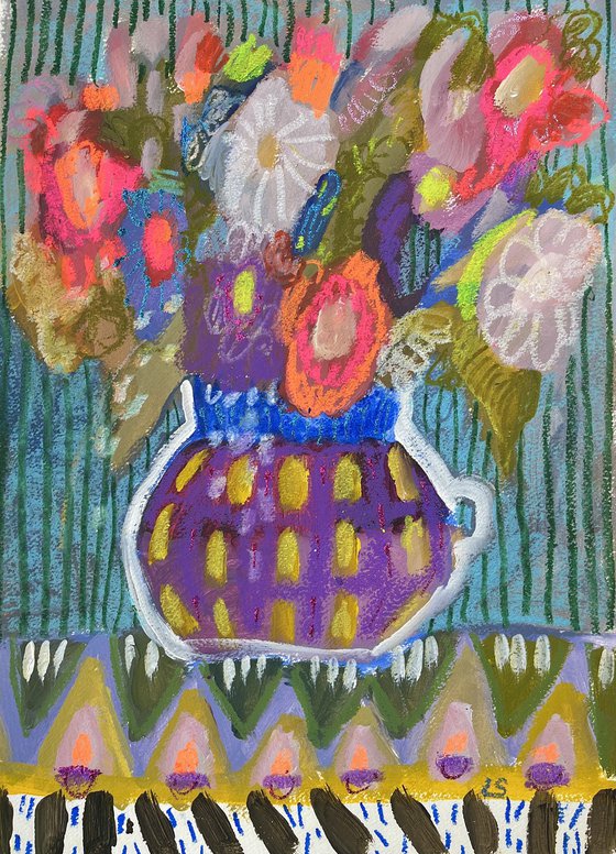 Flowers in purple vase