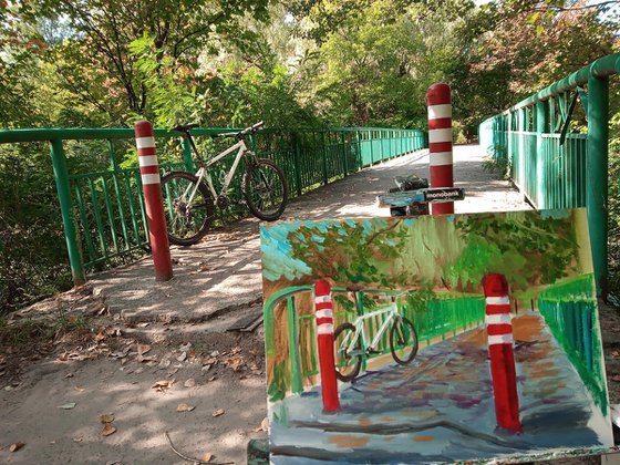 Bicycle on the bridge in the park. Pleinair painting