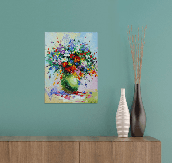 A bouquet of meadow flowers in a vase