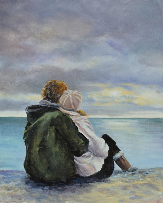 Couple in a cloudy seascape