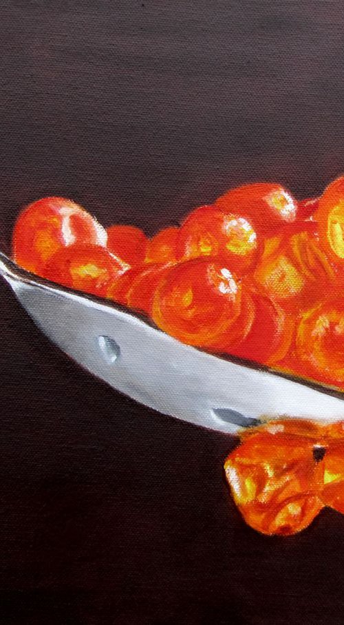 Red caviar in the spoon. Still life by Ira Whittaker