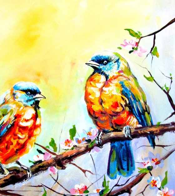 Birds with flowering branch
