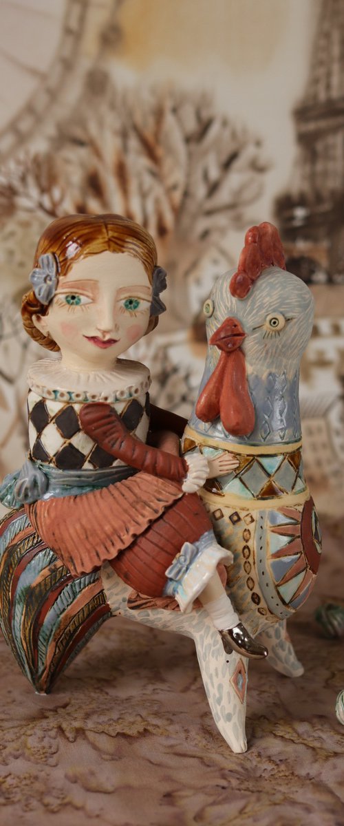 Vintage dressed girl riding the rooster. From "Le Carousel, Hommage à l'Innocence" project by Elya Yalonetski by Elya Yalonetski