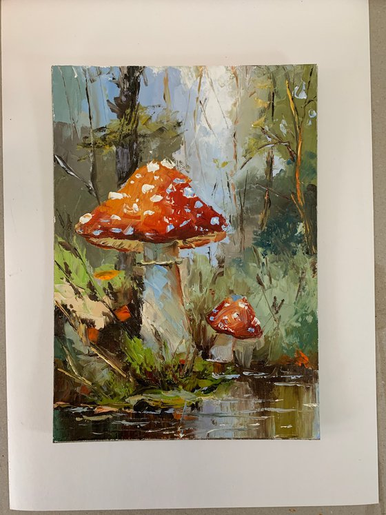 Fly agaric.Mushrooms landscape