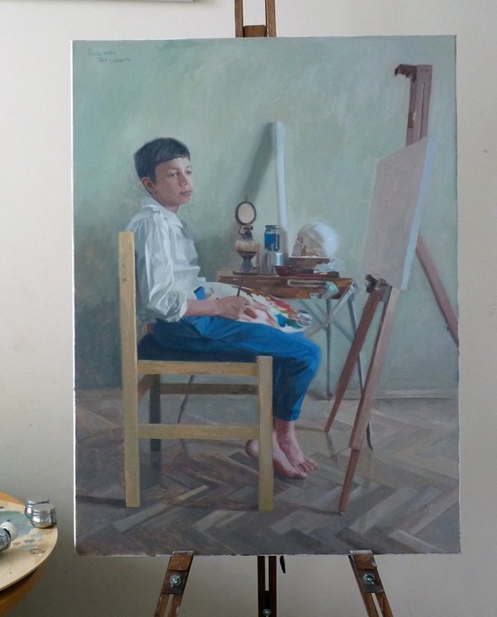 Boy infront a tripod