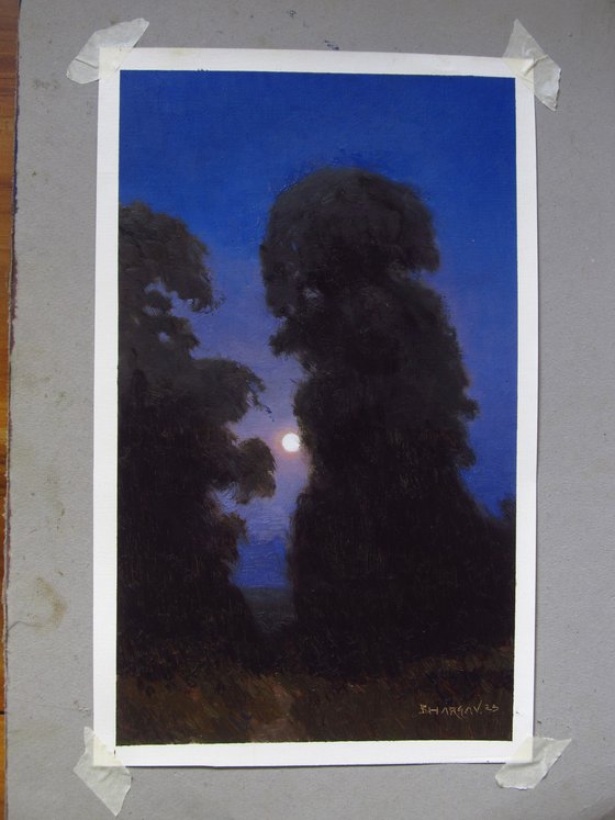Moonrise through trees