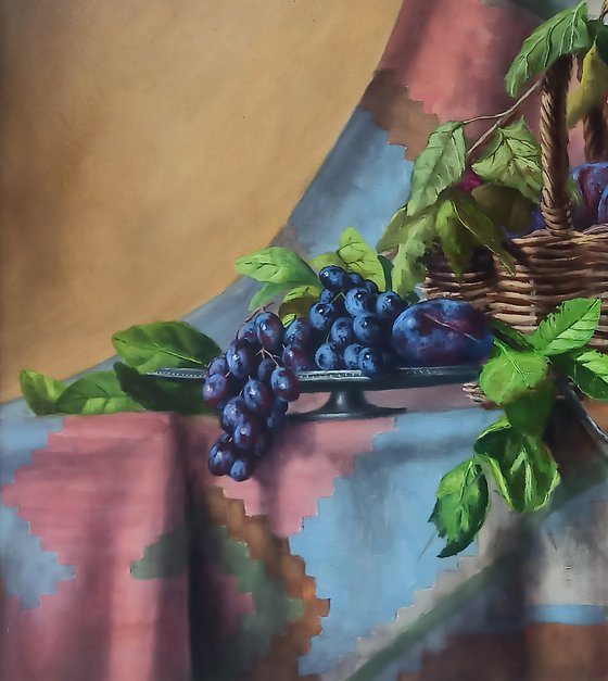 Still life with plums and grapes