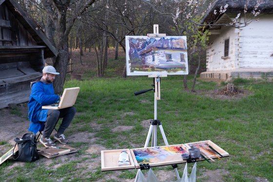 Old Ukrainian hut. Spring