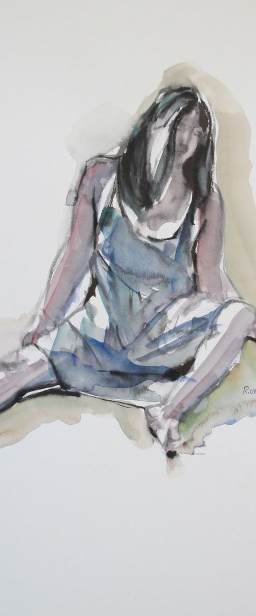 Seated female in a blue dress by Rory O’Neill