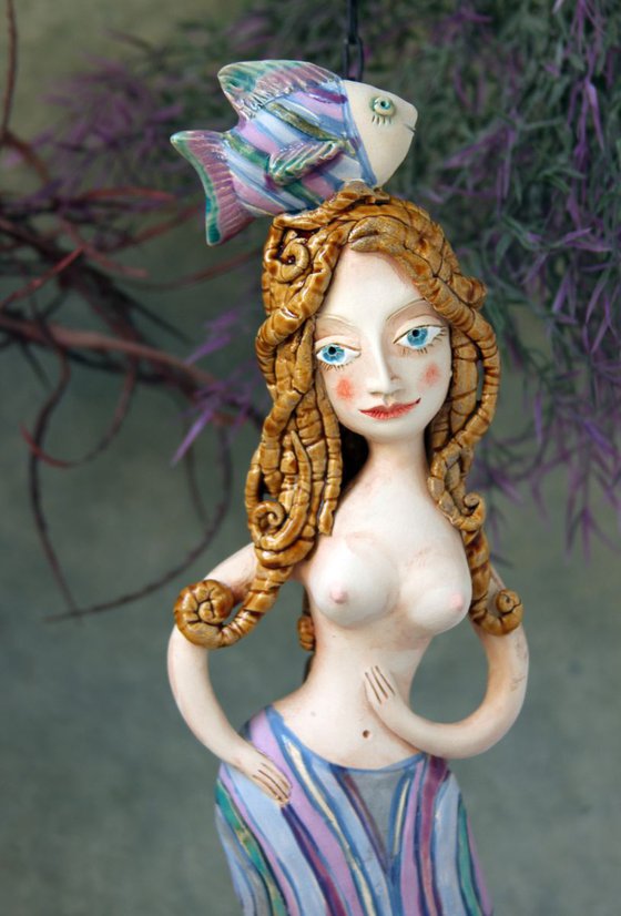 Mermaid with a fish,  Wall sculpture by Elya Yalonetski.