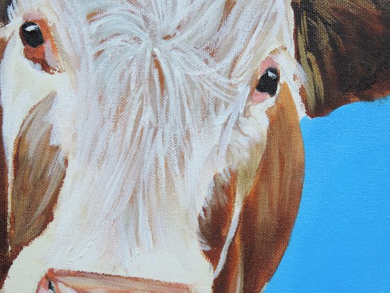 Cow portrait painting in blue