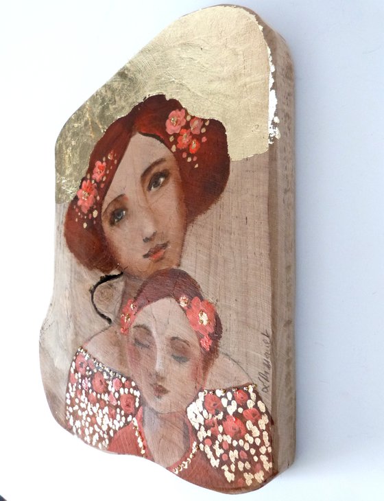 Mother and daughter, portrait on wood, piece of teak. Pink osmosis.