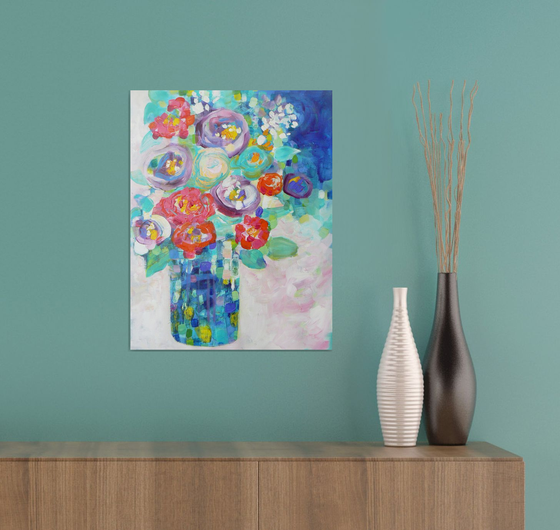 Blue vase of flowers