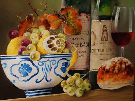 Still life with wine bottle and bowl of fruit