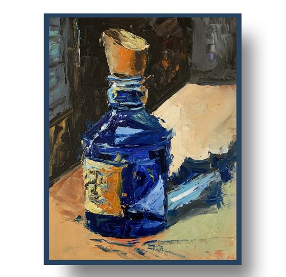 Colorful blue glass mystery bottle.
