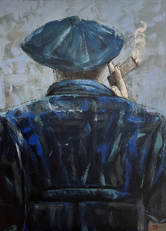 Man in blue smoking a cigar
