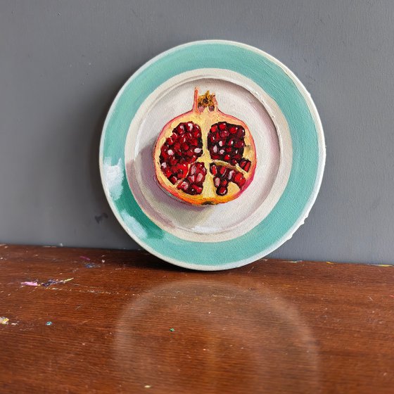 Pomegranate on plate