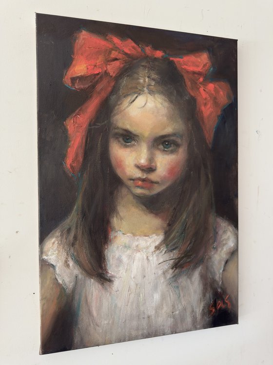 Girl with a red bow. Before.