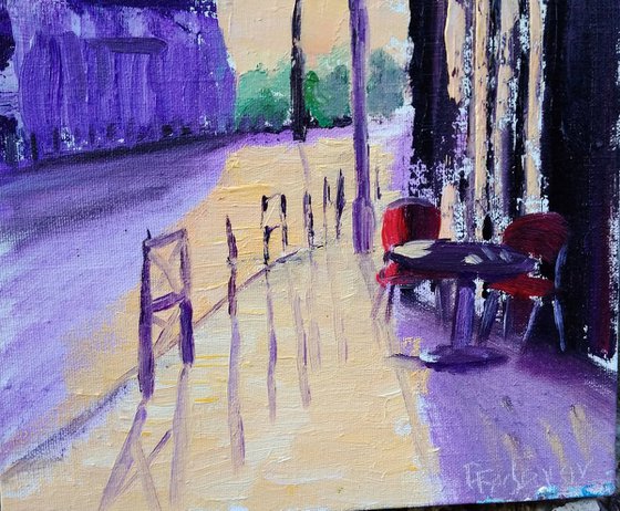 Sunrise in Paris. Street cafe