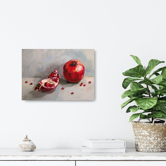 Ripe pomegranate with seeds still life 2