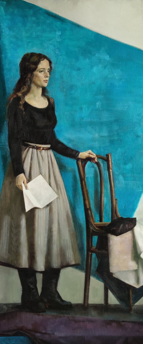 A girl with a letter in blue by Maria Egorova