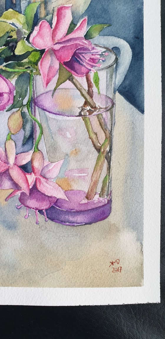 Fushia flowers on painter's table