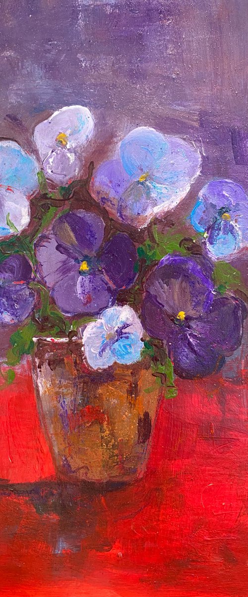 Purple pansies in a pot by Teresa Tanner