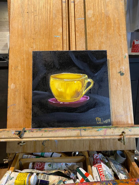 Yellow coffee cup still life