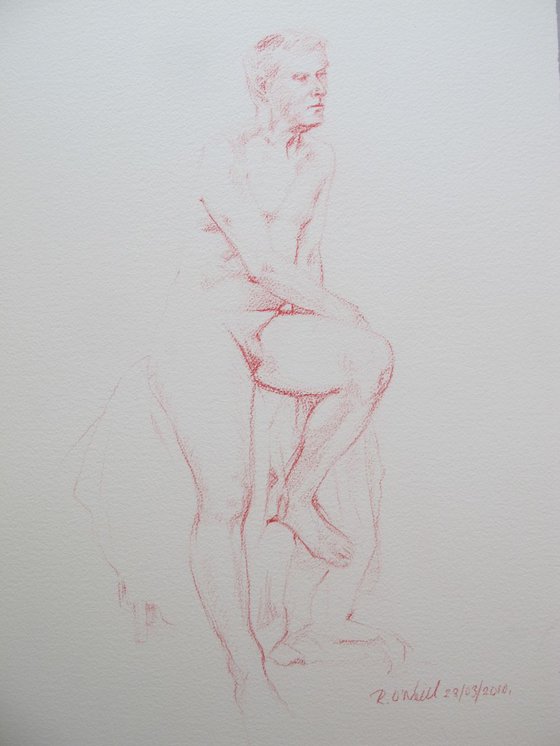 seated male nude