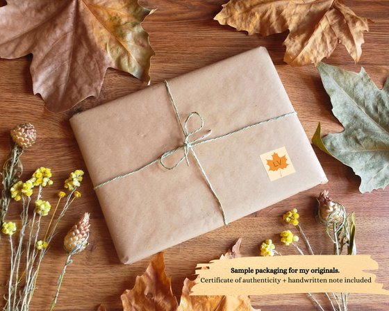 Hedgehog with acorn in fall