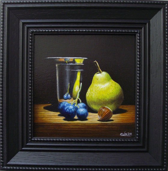 Pear and grape in silver goblet