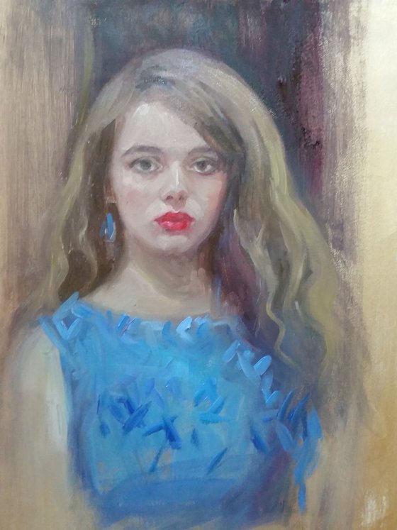 portrait of a young lady in blue dress