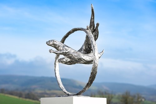 ""Through Clear Water" Otters Swimming Through Ring in Stainless Steel metal by Tanya Russell