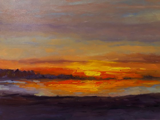 Sunset over marshland