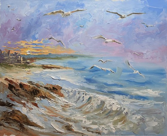 Seagulls over the tide.
