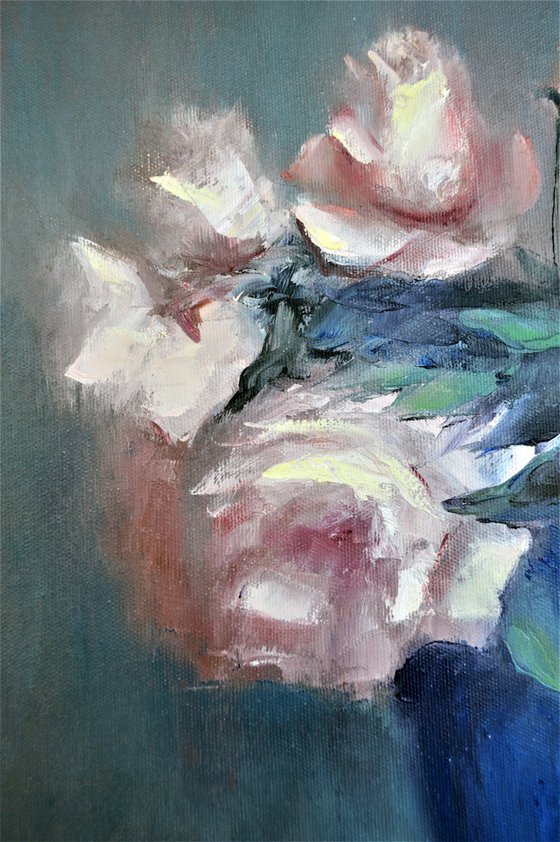 Roses in a blue vase