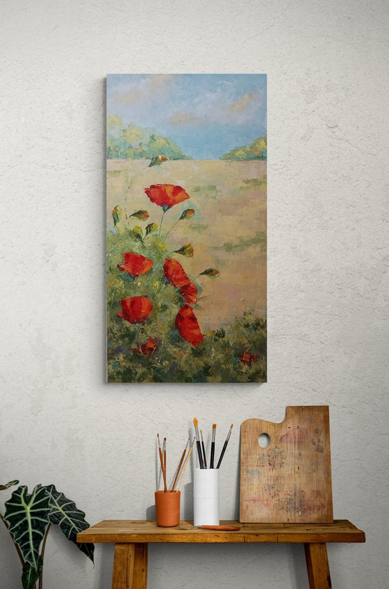 Red poppy flowers in the field