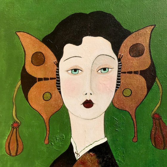 Woman with golden butterflies